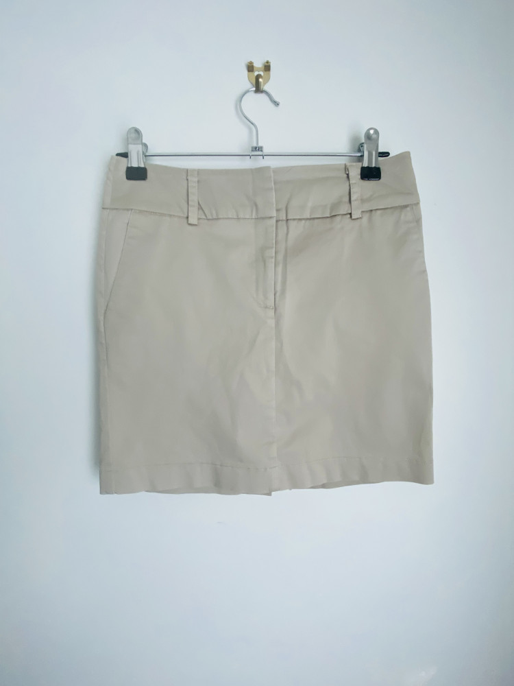 Portman’s Beige Mini Skirt