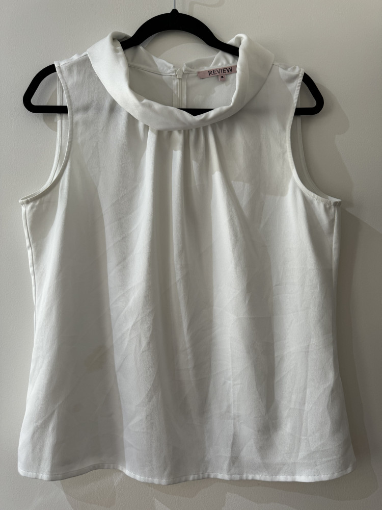 White silky sleeveless top with cowl neck