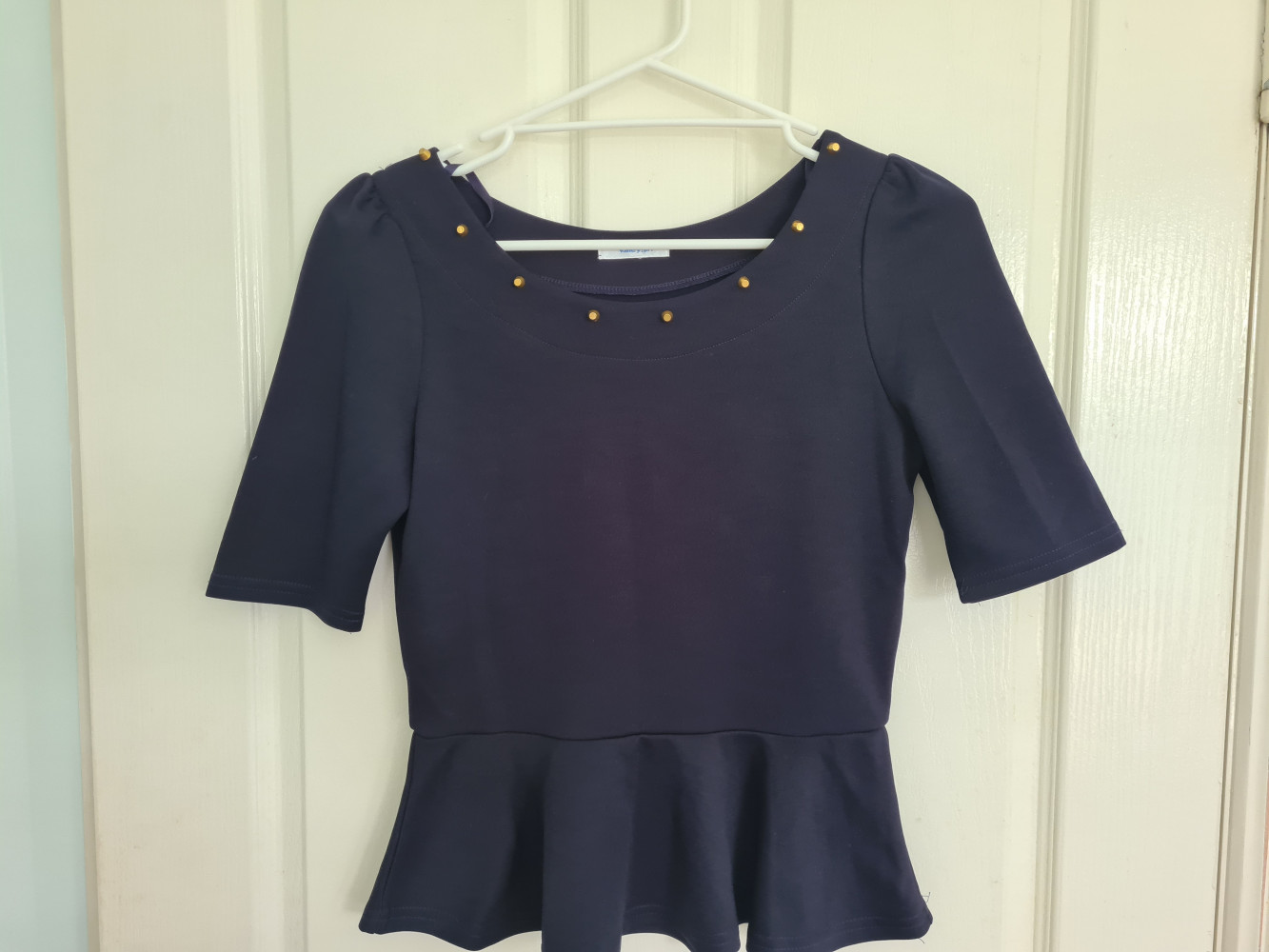 Navy peplum business top