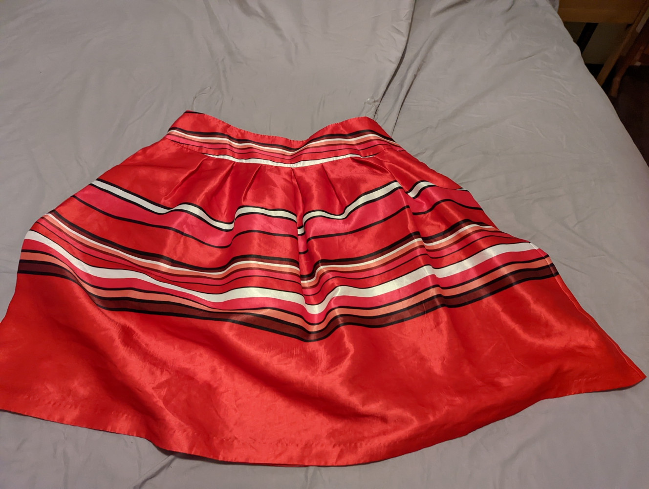 Red pink white and black silky skirt