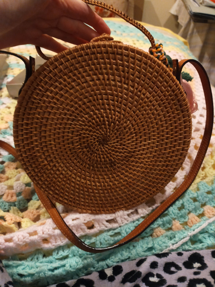 Round woven cane handbag
